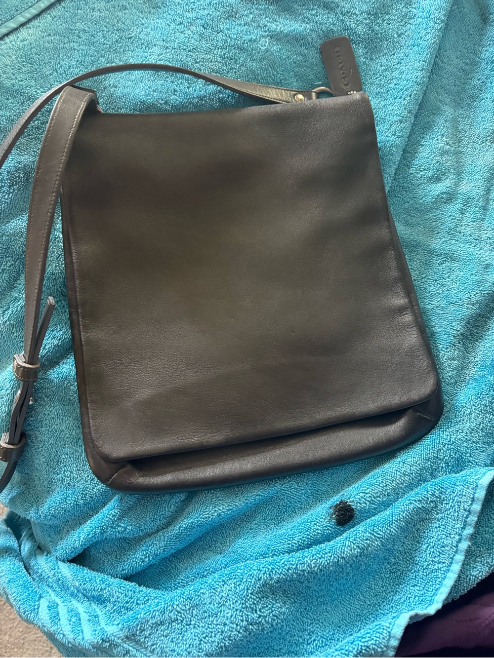 Stylish older Black coach, large barely used